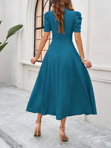 Women's midi dress with V-neck and puff sleeves