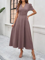Women's midi dress with V-neck and puff sleeves