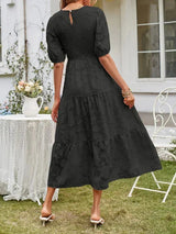 Textured women's midi dress with short sleeves and ruffles