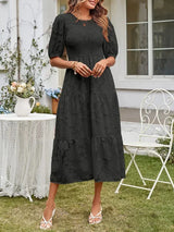 Textured women's midi dress with short sleeves and ruffles