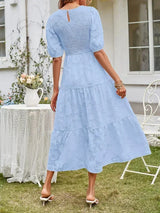 Textured women's midi dress with short sleeves and ruffles