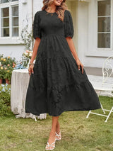 Textured women's midi dress with short sleeves and ruffles